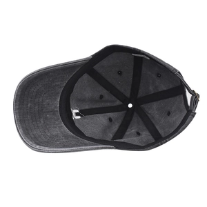 Detail of the internal six-panel structure and reinforced seams of a washed cotton cap