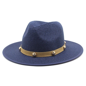 Ethnic navy blue straw fedora hat with brown studded band and flat brim for sun protection