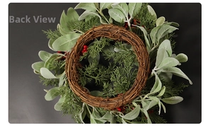 Rear view of festive Christmas wreath showing brown woven rattan base and greenery