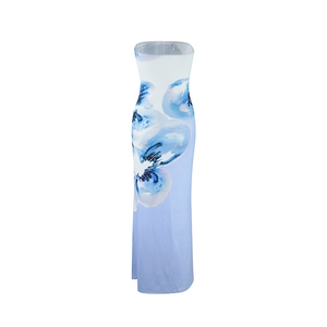 Detail view of the floral blue gradient hem on the white strapless maxi dress