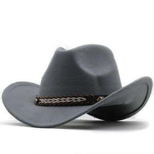 Detail of grey wool felt cowboy hat with woven leather band and gold diamond studs