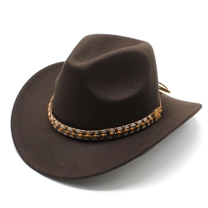 Dark brown wool felt western cowboy hat with a decorative beaded band and wide curved brim