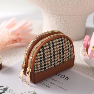 Brown houndstooth canvas mini coin purse with double zippers and stylish curved design