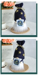 Macro detail of Pisces zodiac gnome with navy knit hat and golden stars on woven base