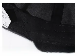 Close-up of internal thickened cotton sweatband and double stitching on baseball cap