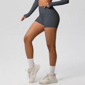Side view of high-waisted seamless dark gray yoga shorts with elastic lifting fit