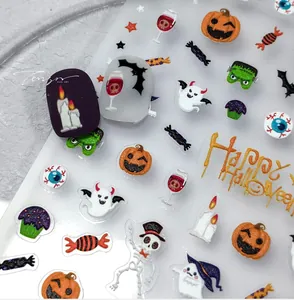 Détail de stickers à ongles 5D Halloween avec motifs de citrouilles et crânes