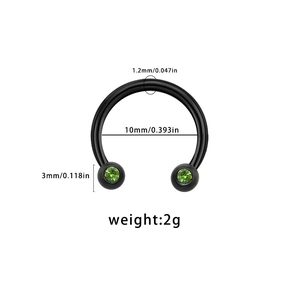 Detail of 1.2mm horseshoe nose ring with black finish and green maple leaf stones