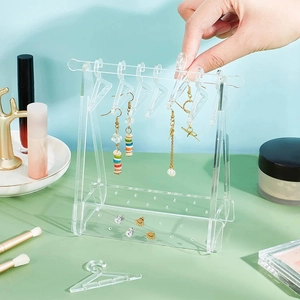 Creative acrylic jewelry organizer with hanger design for earrings and necklaces