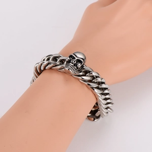 Mens minimalist silver stainless steel chunky chain bracelet with skull design on wrist