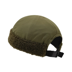 Olive green docker hat with warm sherpa trim and adjustable buckle for winter outdoor wear