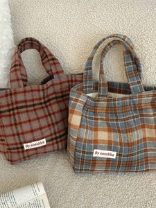 Retro plaid tote bag with vintage wool fabric pattern in autumn and winter colors