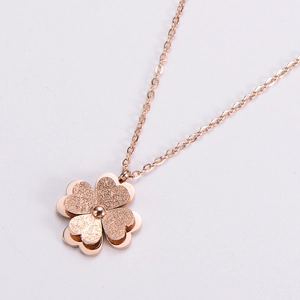 Rose gold stainless steel necklace featuring a 3D clover pendant with sandblasted finish