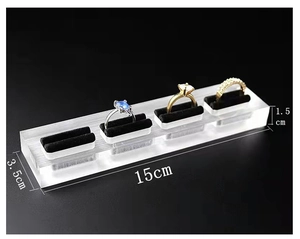 Clear acrylic ring display stand with velvet slots and dimensions 15x3.5x1.5cm