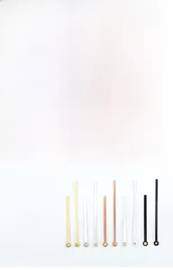 Product display of minimalist aluminum clock hands model 983 in four metallic colors