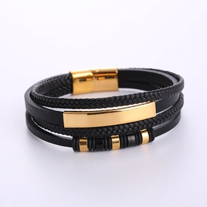 Men's multilayer braided leather bracelet with golden magnetic clasp on gray background