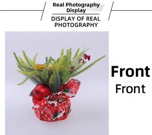 Close-up of Christmas candle holder with red berries, pine cones and festive base