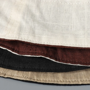 Linen reversible sun hat in various colors showing premium fabric texture and double stitching