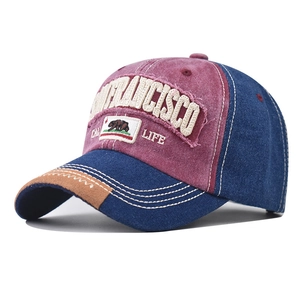 Detail of San Francisco embroidery and vintage washed denim on this baseball cap