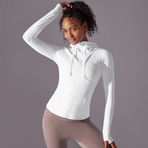 Close-up of white zip-up sports hoodie featuring functional thumbholes and drawstring hood