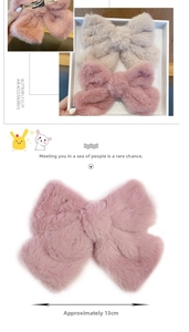 Detail of plush bow hair clip showing 13cm size measurement and metal duckbill clip