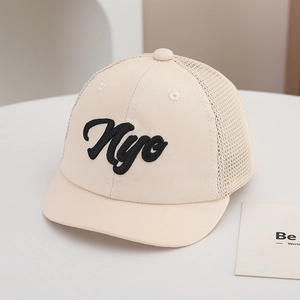Detail of baby baseball cap featuring 3D NYC embroidery and breathable summer mesh