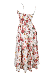 Detail view of the white floral maxi dress featuring a backless strap design and flowy fabric