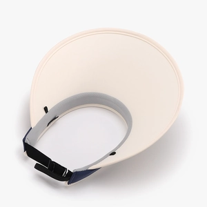 Women's UV protection visor hat in beige with gray lining and adjustable back strap
