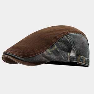 Detail view of cotton patchwork flat cap with brown corduroy and blue distressed denim fabric