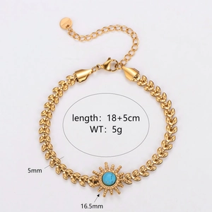 Vintage stainless steel gold leaf bracelet with sunburst turquoise stone charm