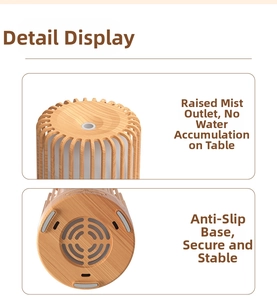 Detail of wood grain diffuser showing upward mist vent and non-slip anti-vibration base