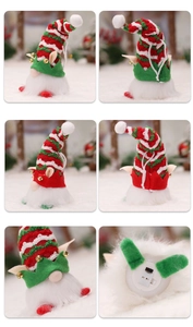 Close-up of glowing Christmas elf doll with striped hat and internal LED battery compartment