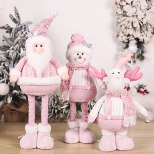 Pink and white Christmas plush figurines set of Santa, Snowman, and Reindeer on wood