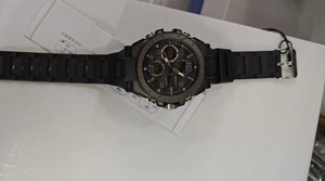 Detail view of SANDA dual-display sports watch with analog and digital water-resistant dial