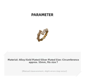 Detailed view of bamboo joint ring with micro-set zircons and cat eye stone inlay
