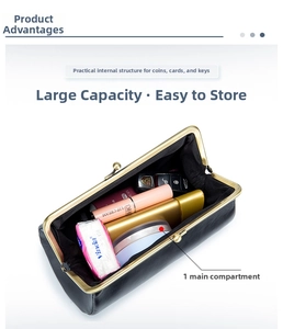 Internal view of leather clutch bag showing capacity for lipstick and car keys