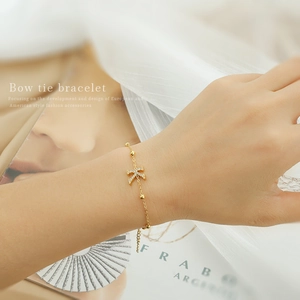 Elegant gold letter K pendant bracelet with sparkling cubic zirconia on a dainty chain