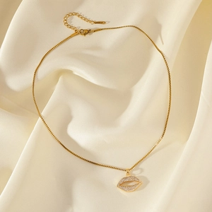 Gold-plated stainless steel necklace with hollow lip pendant and pavé zircon stones