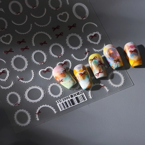 Autocollants 5D pour ongles avec dentelle blanche et nœuds rouges style TS-3999