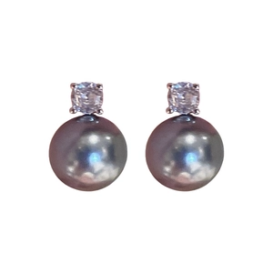 Elegant silver earrings featuring a round crystal stud and a polished black pearl drop