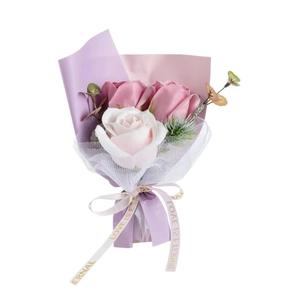 Mini soap rose bouquet in pink and white wrapping with Love Is Eternal ribbon