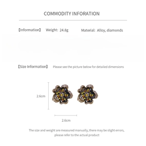 Detailed view showing product size and weight info for vintage floral stud earrings
