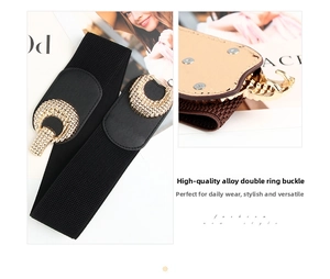Detail view of black elastic wide waist belt with golden alloy hook buckle for dresses