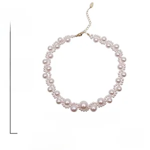 Detailed view of woven pearl choker with 12.4g weight and 37.2cm length dimensions