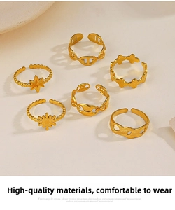 Detailed view of 6-piece gold adjustable ring set featuring sun and star motifs