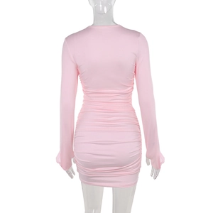 Close-up of the elegant pink ruched dress featuring a slim fit and detailed back ruching