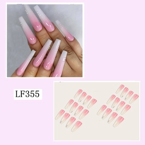 Long pink gradient coffin fake nails with glitter accent and 24-piece nail set display