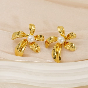 Chic 2025 gold flower earrings with pearl center in elegant irregular floral design