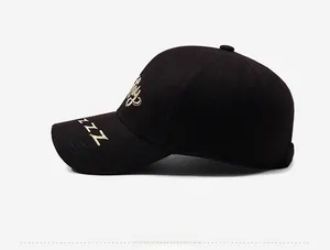 Side view of black cotton baseball cap featuring gold ZZZ embroidery on the brim