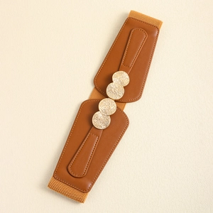 Detail of a brown elastic waist belt with PU leather patches and gold embossed buckles